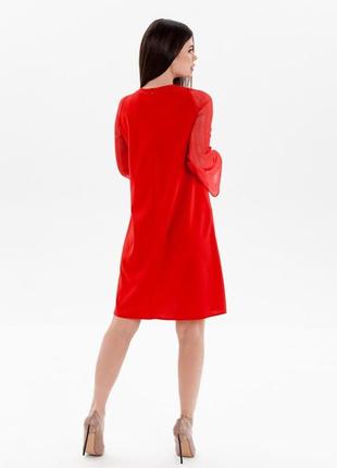 Красное платье-трапеция с полупрозрачными рукавами3 фото