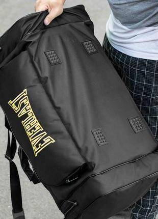 Спортивная мужская дорожная сумка everlast biz yellow черная тканевая в поездок на 60 литров для экипировки и4 фото