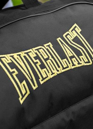 Спортивная мужская дорожная сумка everlast biz yellow черная тканевая в поездок на 60 литров для экипировки и7 фото