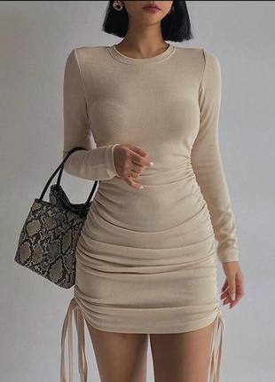 Облегающее короткое платье из трикотажа  размеры норма2 фото