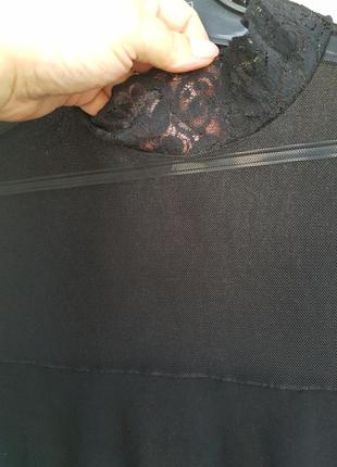 Чорна блузка з прозорими рукавами.2 фото