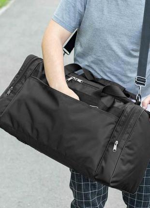 Велика дорожня спортивна сумка fat чорна тканинна для поїздок і тренувань у залі на 60 літрів міцна4 фото