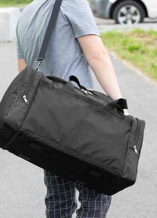 Большая дорожная спортивная сумка fat черная тканевая для поездок и тренировок в зале на 60 литров прочная3 фото