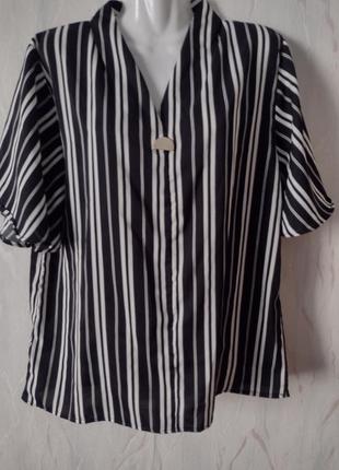 Очень красивая стильная блузка с интересным рукавом