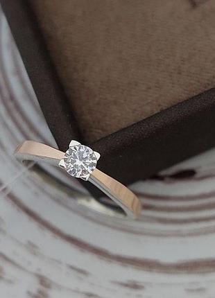 Серебряное кольцо с золотом и фианитом