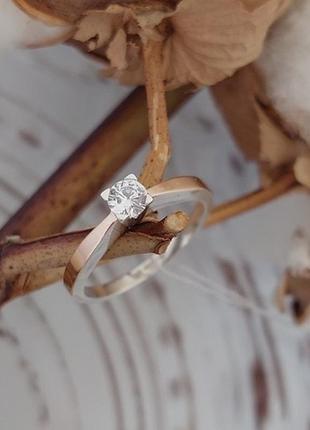 Серебряное кольцо с золотом и фианитом