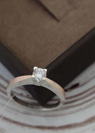 Серебряное кольцо с золотом и фианитом