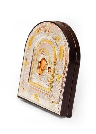 Казанская икона божией матери 12х14см арочной формы на коричневой коже2 фото