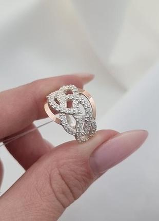 Серебряное кольцо с золотыми вставками и цирконами4 фото