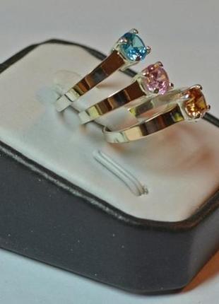 Серебряное кольцо с золотом и цирконом5 фото