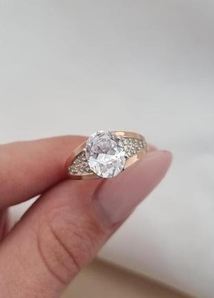 Серебряное кольцо с золотыми пластинами и крупным цирконом3 фото