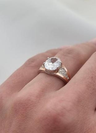 Серебряное кольцо с золотыми пластинами и крупным цирконом5 фото