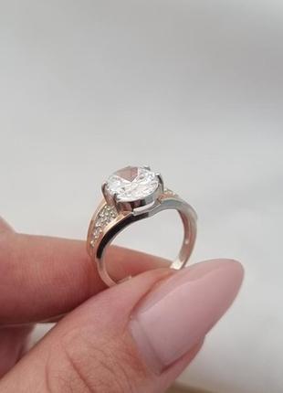 Серебряное кольцо с золотыми пластинами и крупным цирконом4 фото