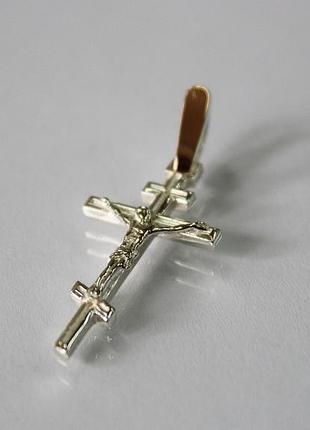 Серебряный крестик с золотыми вставками