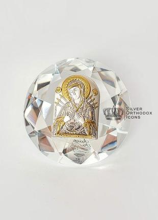 Срібна ікона семистрільна божа матір в кришталі, що має форму кристалу