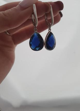 Серебряный комплект серьги и кольцо с большими синими камнями9 фото