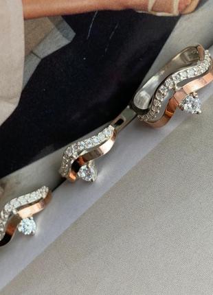 Комплект серебряный с золотом: кольцо и серьги с фианитами разных цветов4 фото