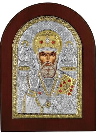 Срібна ікона миколая чудотворця 20х25см в коричневому дереві