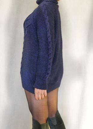 Темно-синій светр з косами. кабельна в'язка