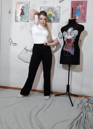 Жіночі трикотажні вільні чорні бавовняні штани