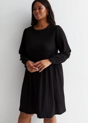 Базовое черное платье из фактурного трикотажа3 фото