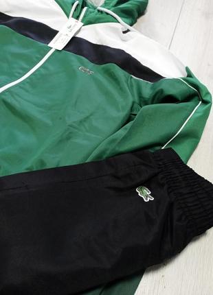 Мужской спортивный костюм lacoste черный/зеленый (ветровка + брюки)5 фото