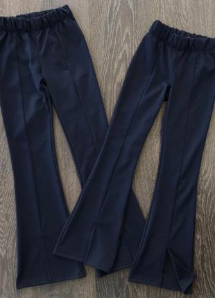 Черные и темно-синие брюки на девочку2 фото