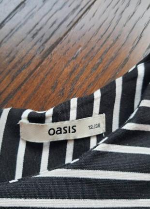 Черно-белая блузка с баской