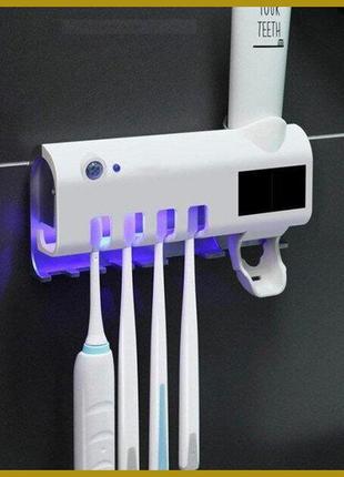 Автоматичний диспенсер для зубної пасти тримач для щіток toothbrush sterilizer уф-стерилізатор1 фото