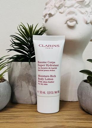 Оригінал зволожуючий бальзам clarins moisture-rich body оригинал крем лосьон для тела