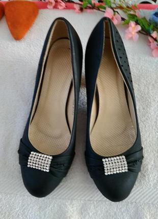 Туфлі.