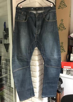 Чоловічі джинси oodji designed in france завужені з низькою посадкою