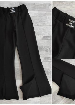 Стильные брюки с разрезом