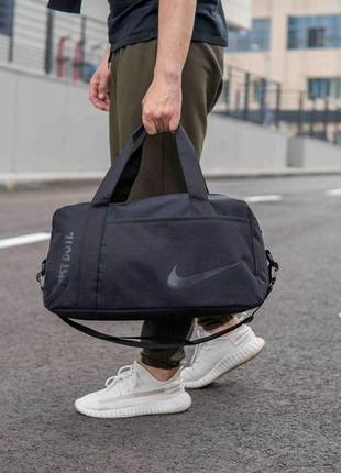 Спортивна сумка nike just do it тканинна чорна для тренажерного залу та фітнесу якісна на 27 літрів10 фото