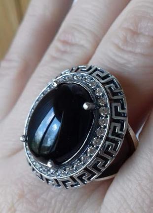 Серебряное кольцо с ониксом элвис