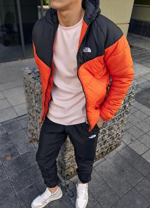 Куртка tnf черно-оранжевая3 фото