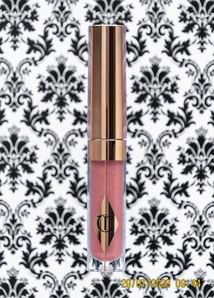 Питательный блеск с витамином е для губ charlotte tilbury jewel lips gloss pillow talk 1.4 г1 фото