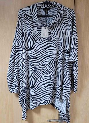 Тонкий свитер оверсайз.