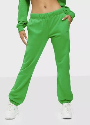Нові зелені спортивні штани на флісі бренду nunoo