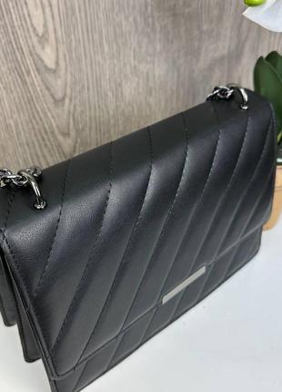 Качественная стильная черная мини сумка клатч для девушки с цепочкой  на плечо3 фото