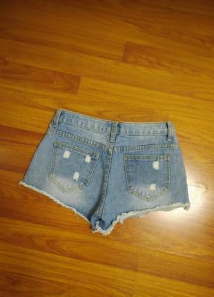 Блакитні джинсові шорти рвані зістарені короткі жіночі шортики котонові з потертостями бахромою2 фото