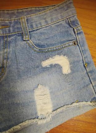 Блакитні джинсові шорти рвані зістарені короткі жіночі шортики котонові з потертостями бахромою4 фото