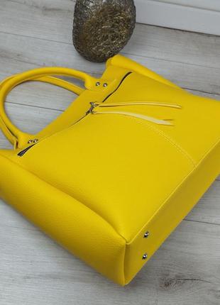 Большая вместительная женская сумка с ручками и длинным ремнем4 фото