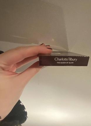 Палетка тіней charlotte tilbury the queen of glow luxury palette, 5 гр.9 фото