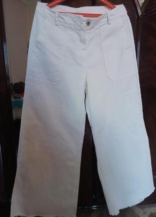 Джинсы клеш