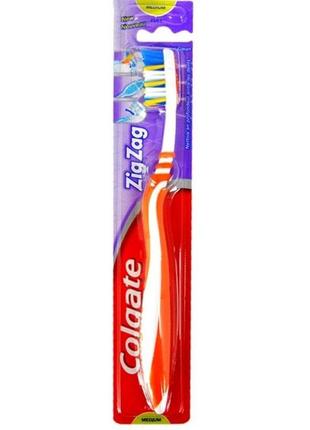 Зубна щітка colgate zig zag medium toothbrush (зиґ заг) (6001067004943)1 фото