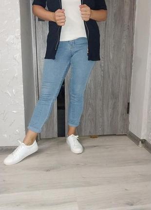 Подовжена жилетка з кишенями