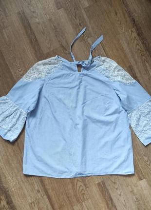 Изысканная свободная блуза с кружевом в мелкую полоску с завязками на спине и укороченными рукавами2 фото