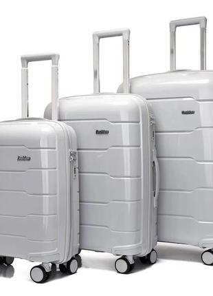 Комплект чемоданов 4-х колесных4 фото