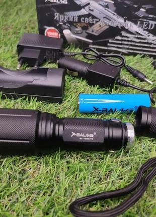 Ліхтарик bailong вологостійкий ✅має zoom дальність 400 метрів ✅ працює від акумулятора 18650 має 🔹зарядний пристрій4 фото